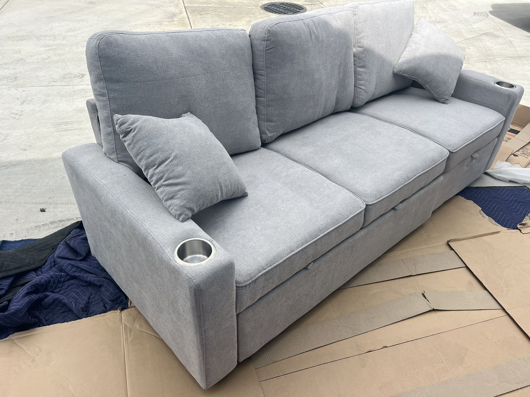 New Couch W Pullout Bed / Chaise Storage. Grey. 82x33Dx32. Free Delivery!