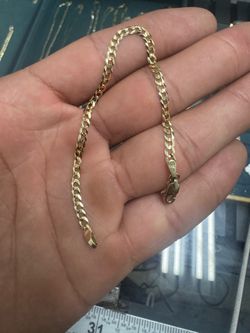 14k gold curb link bracelet