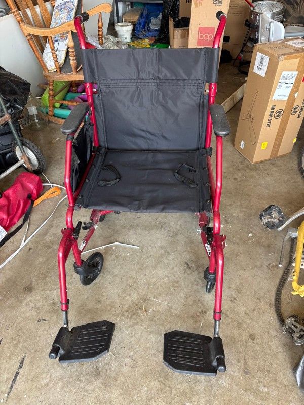A wheelchair. NEW ORIGINAL PRICE $89 