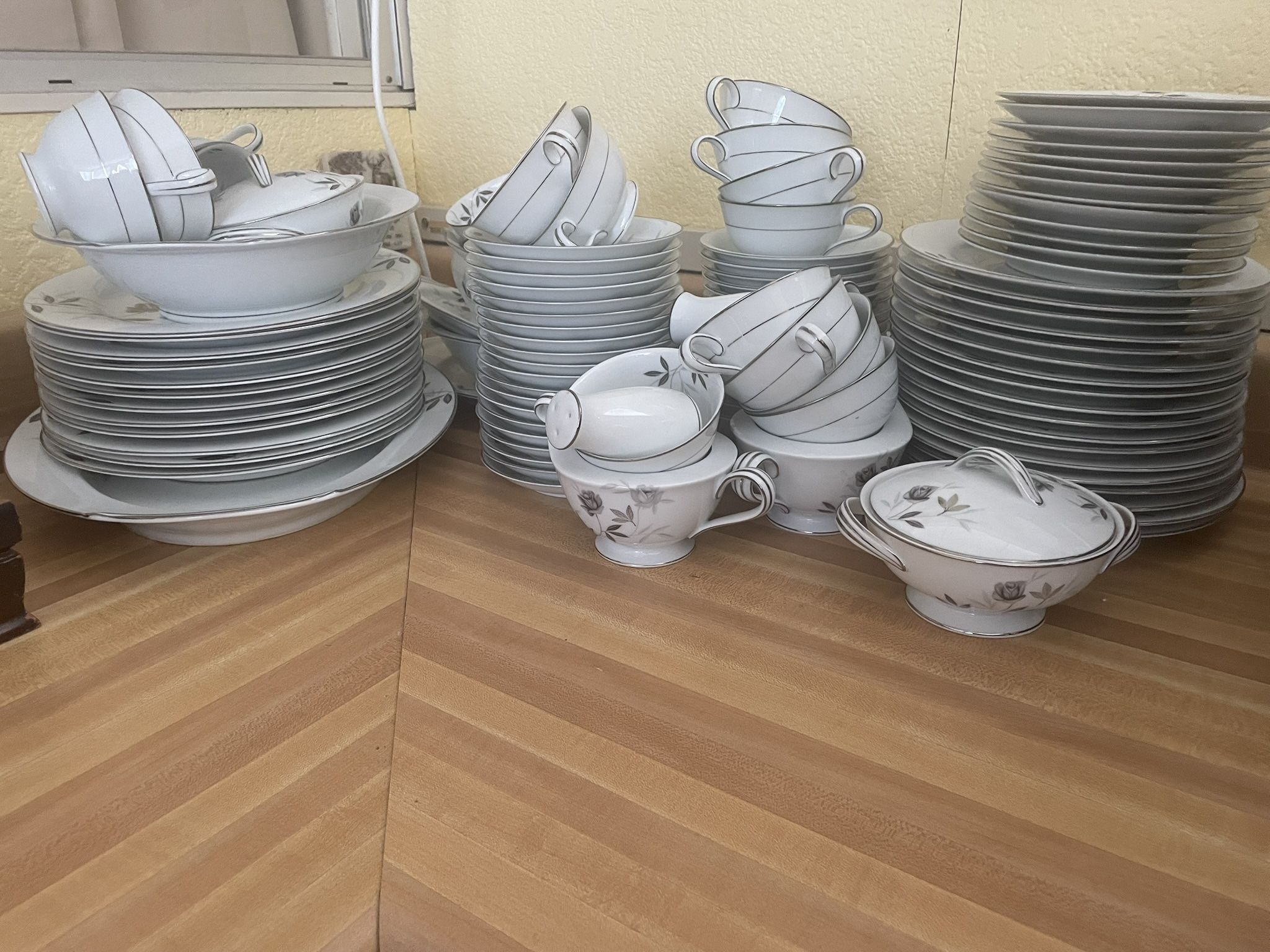 Large set of Noritake dinnerware great for Christmas setting