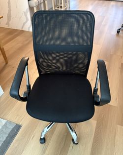 Multiple Black Mesh Office Chairs