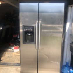 Side-by-side stainless steel refrigerator