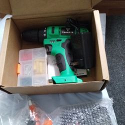 20 VOLT DRILL WITH A FEW TOOLS