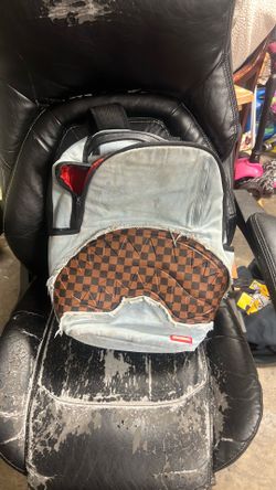 Spray ground backpack