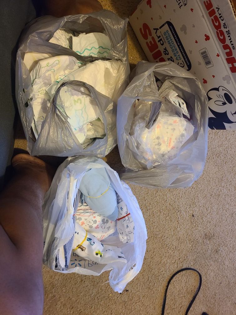 Diapers and 4 receiving blankets