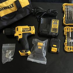 Dewalt 12 V with charger and two batteries like new