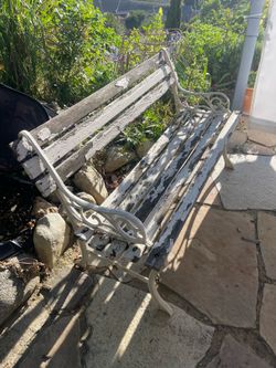Vintage wrought iron and wood slat bench