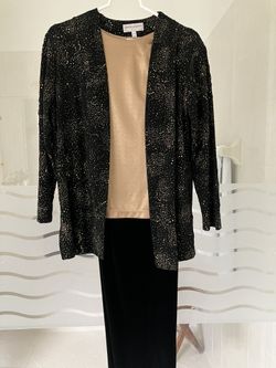 Draper's And Demian's Black And Gold Outfit