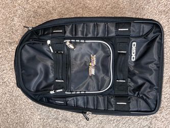 Used Royal Purple rolling travel suitcase