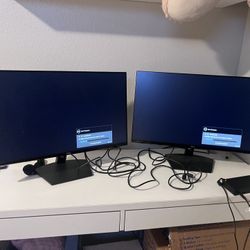 Two - 27 Inch Monitors 