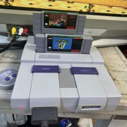 Super Nintendo W/ 2 Games 