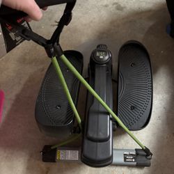 Compact Elliptical Machine With Resistance Cords