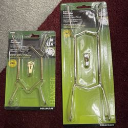 (10) Small And (20) Large Plate Hangers Brand New $3 Each 