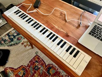 Carry-On Toy Folding Piano 49-Key Portable Digital Keyboard & MIDI Controller