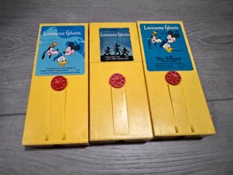 Vintage 1970s Fisher-Price "Lonesome Ghosts" movie view cartridges for portable movie viewer