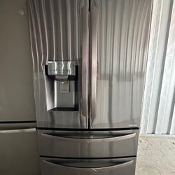 LG 4-door black stainless steel refrigerator for sale with 3 months warranty Price 850