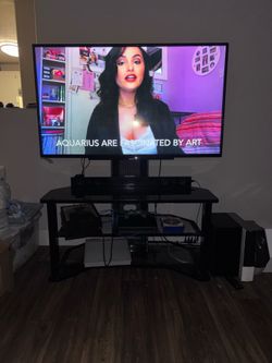 Entertainment center holds up to 65 in tv