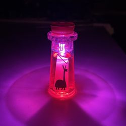 Disney Disneyland Kuzco’s Poison Bottle Glow Cube