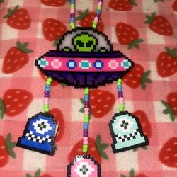 Alien abducting Subtronics perler necklace