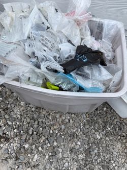 Full tote of new hardware bolts and screws