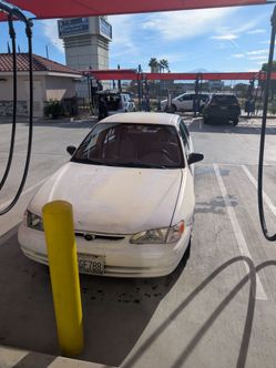 Toyota Corolla White Sedan