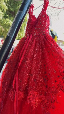 Red dress worn only once for 12-year-old girl