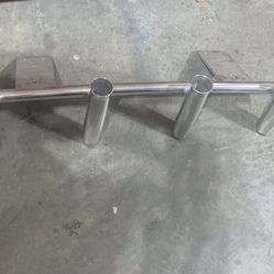 Fish pole holder for truck or trailer