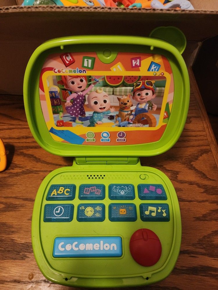 CoComelon Sing and Learn Laptop Toy for Kids, Lights, Sounds, and Music Encourages Letter, Number, Shape, and Animal Recognition