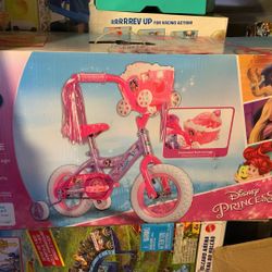 HUFFY DISNEY PRINCESS 12” BICYCLE INCLUDES ENCHANTED DOLL CARRIAGE 