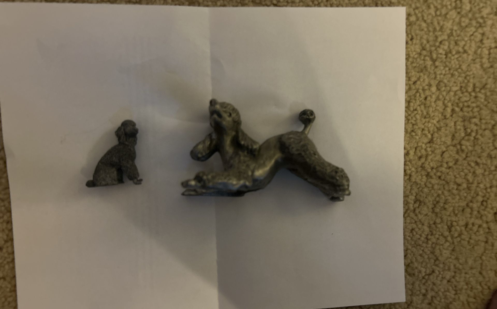 Two Solid Pewter Dog Statues
