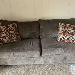 Couch and Ottoman With Storage Compartment