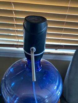 Water jug dispenser. Works great. We bought upright. No longer need