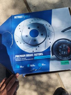Drilled slotted rotors and brake pads
