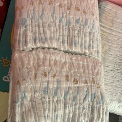 new born and size 1 diapers 