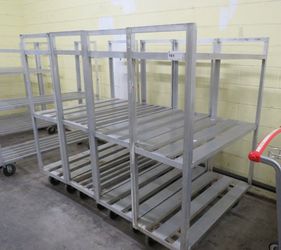 Commercial Aluminum freezer/cooler shelves and Carts shelving without wheels start at $50 with 2 sheves and the ones with wheels start at $150-$200 ea