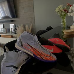 2 pairs of Nike indoor cleats