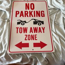 No Parking Tow Away Zone Sign