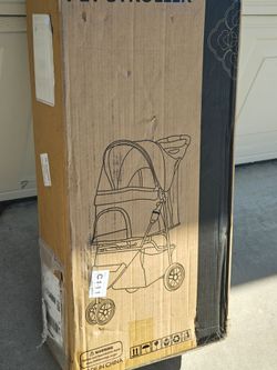 Pet stroller jogger 80 price drop 65 firm no less new never used see pictures