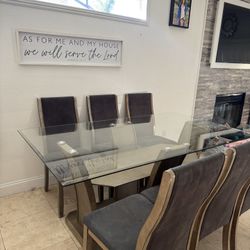 Glass Table And 6 Chairs $275