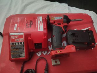Milwaukee impact drill, 5-volt battery and charger