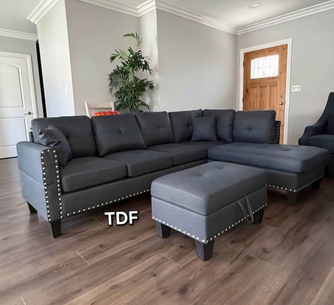 Sectional Sofa with storage ottoman and 2 accent pillows. 