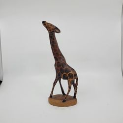 Vintage 13" Hand Carved Wooden Giraffe Figure Made in Kenya Sculpture. 
Pre-owned, good shape, please see photos for details. Display item.  It 
is 13
