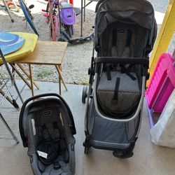 Evenflo Stroller and Car Seat with Diapers 