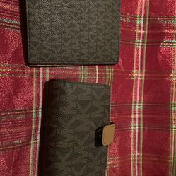 two brand new  MK wallets 
