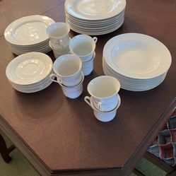 8 place setting Gold trimmed Porcelain Dishes