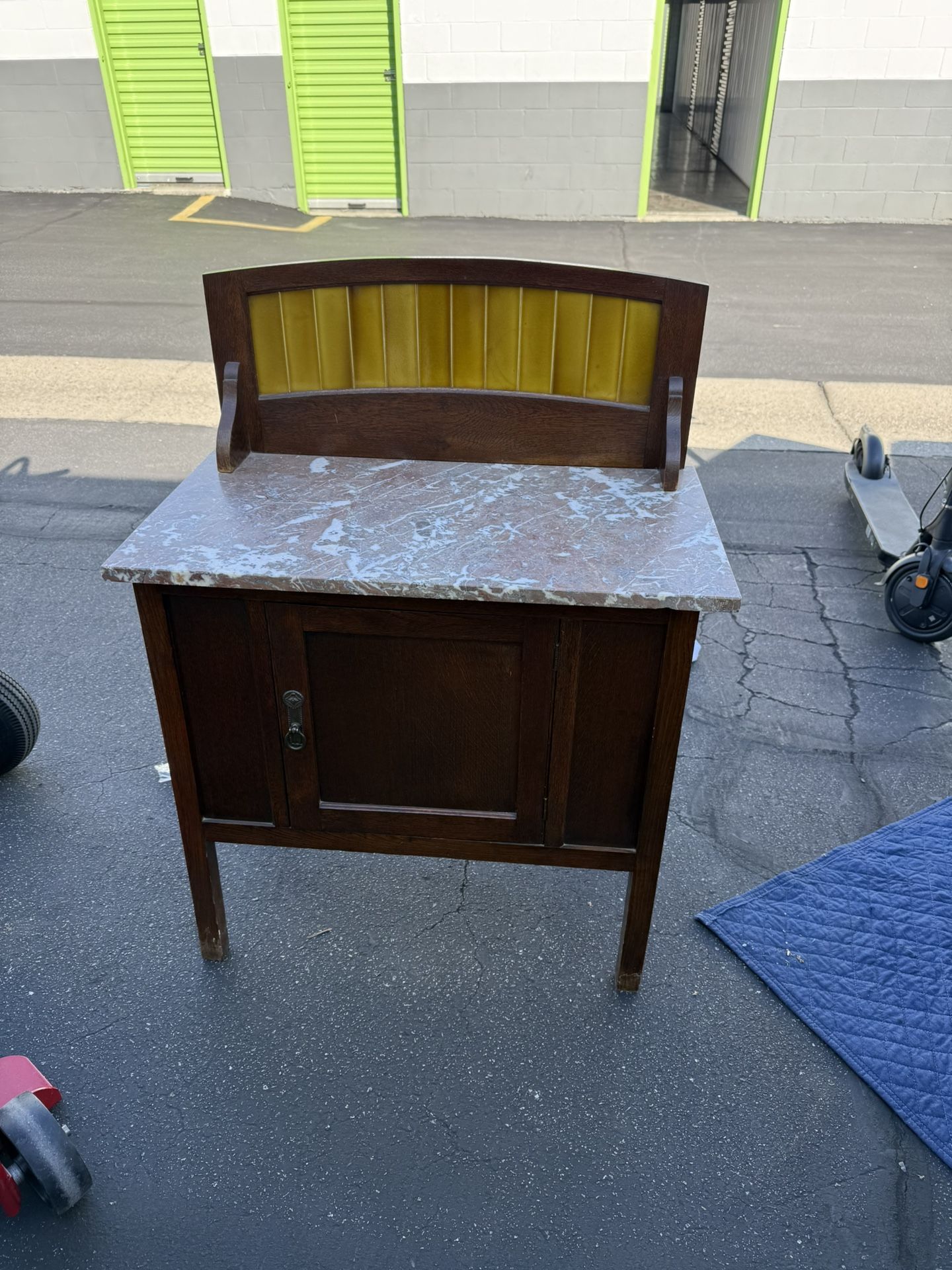 1910s/ 20s silky oak stand with marble top and Yellow tiled back
