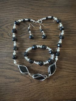 black glass and sliver necklace bracelet, and earrings