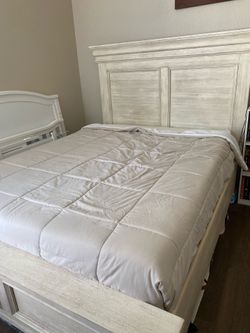 Queen bedframe with headboard and mattress