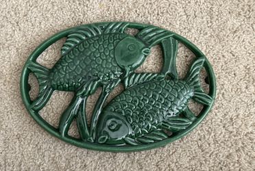 Vintage emerald green cast iron fish trivet