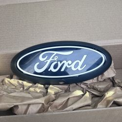 NEW 2024 Ford F-150  Black/White Lettering Oval Grille Emblem W/Camera, OEM